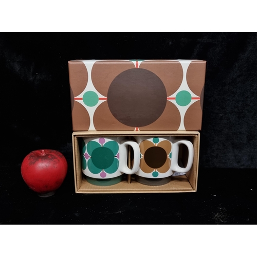 273 - A brand new pair of Orla Kiely stackable mugs in the original box in gifting condition.