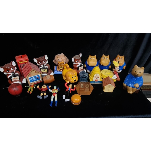 279 - A nostalgic collection of charming vintage moneyboxes including a Mickey Mouse, Paddington and a Thu... 