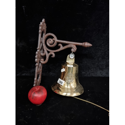 280 - A heavy brass wall mounted last orders bell.