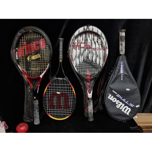 287 - Four good quality tennis racket including two Wilson examples, a Dunlop and a Prince example.