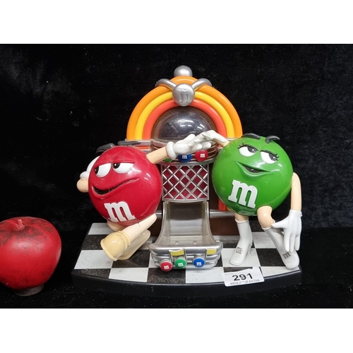 291 - A cool M&M branded sweet dispenser in the form of a rock and roll juke box.