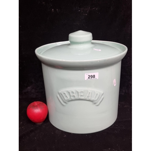 298 - A large ceramic bread bin / crock in a mint green glaze.