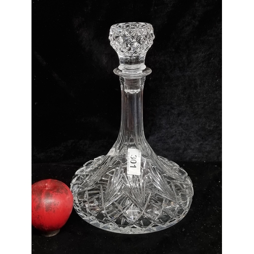 301 - A stunning cut crystal ships decanter with stopper. IN VGC