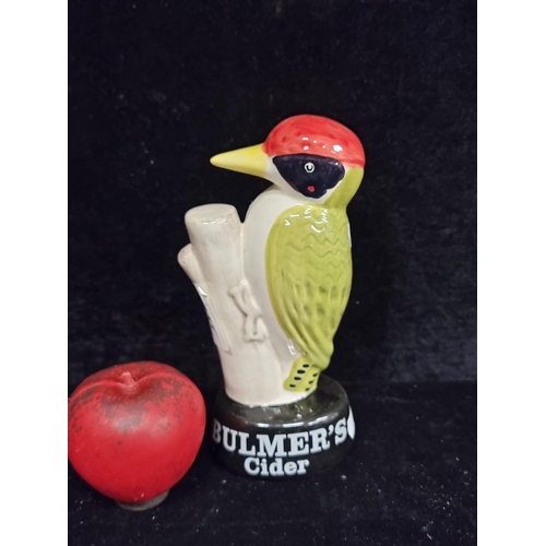 317 - A wonderful ceramic figure in the form of a woodpecker, reading 