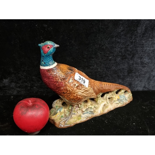 319 - A gorgeous large Beswick porcelain figure of a Pheasant, in a colourful glazed finish. Stamped 1225 ... 