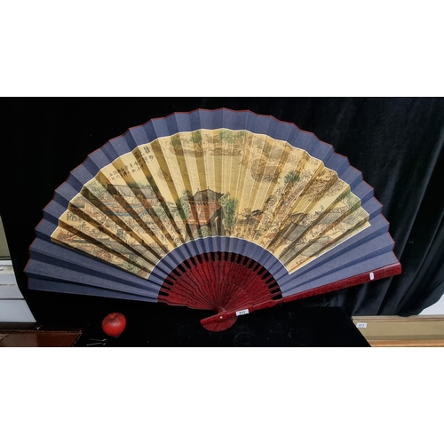 332 - An amazing very large Chinese paper wall fan featuring a beautifully detailed hand painted landscape... 