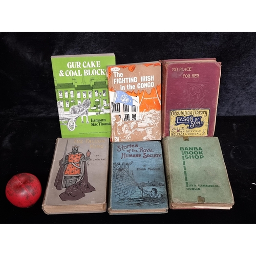 334 - A box containing a number of antique and vintage books including 