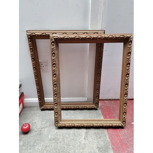 338 - A fabulous pair of antique late Victorian large gilt frames with lovely moulded foliate borders. In ... 