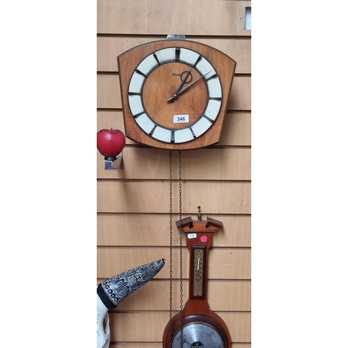 346 - A gorgeous vintage mid century modern pendulum wall clock by Horelco.