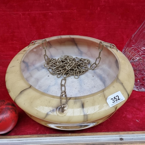 352 - A superb 1960s glass ceiling shade in tones of yellow and black with hanging chain.