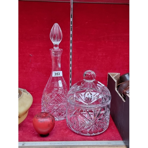 353 - Two elegant cut glass items including a tall decanter along with a lidded biscuit barrel. Both in lo... 