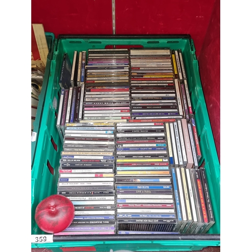 359 - A crate containing an impressive collection of cds from various artists such as Willie Nelson, Barry... 