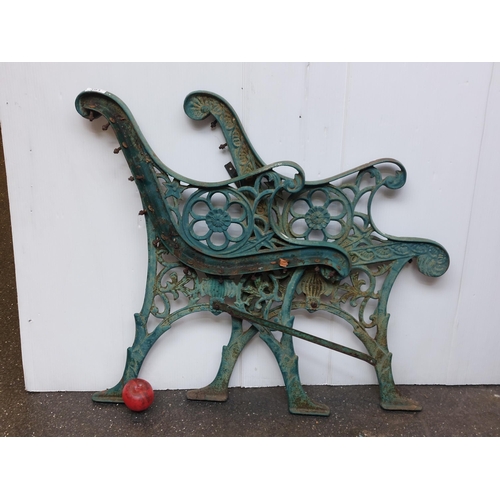 391 - A pair of antique cast iron garden bench ends with beautiful floral and foliate design.