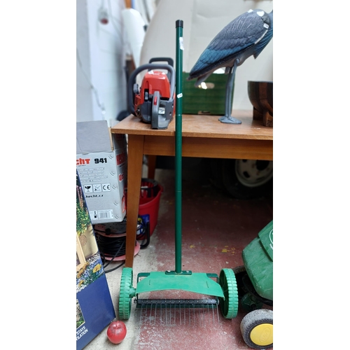 395 - A super handy lawn aerator. Perfect time of year, get those lawns summer ready!