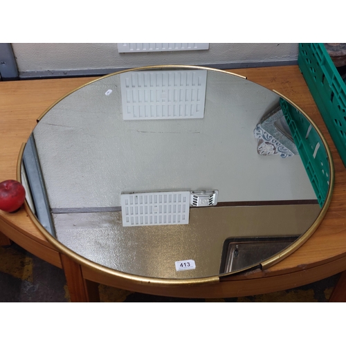 413 - A very impressive Fitzroy round mirror with a tubular notched metal frame. RRP £239.00 on www.galler... 