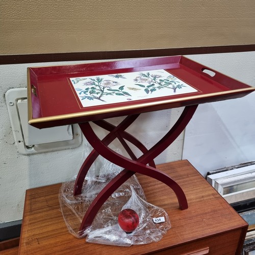 434 - A very pretty tea tray with stand, boasting a botanical illustration of a dog rose to top. Made by P... 