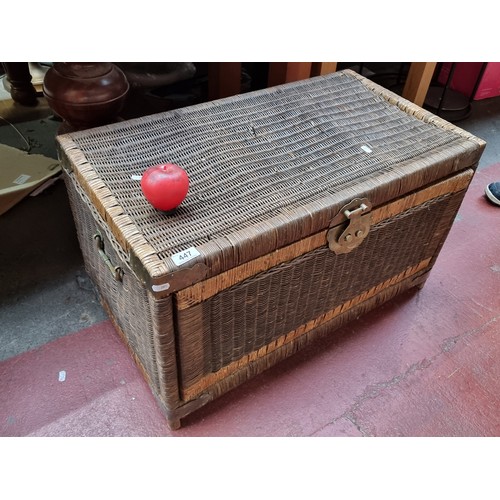 447 - A fabulous large wicker chest with lovely brass handles to side and lock to front. Front panel swing... 