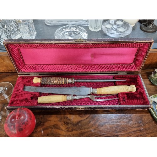 850 - A victorian boxed carving set with Horn handles.