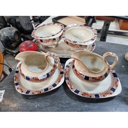 861 - Two pairs of Milk and sugars with a carry tray lovely antique set.