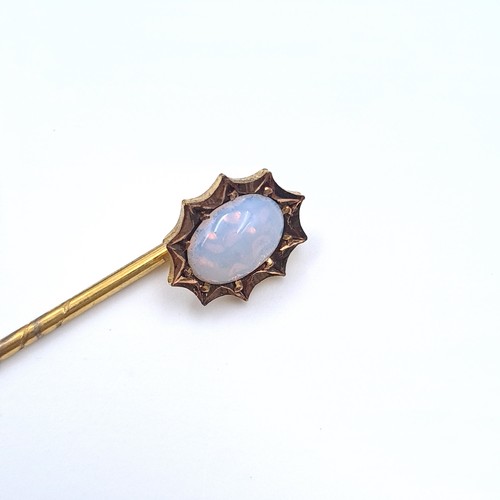 48 - A very pretty bright opal pin, contained in antique box. With lovey colour play.