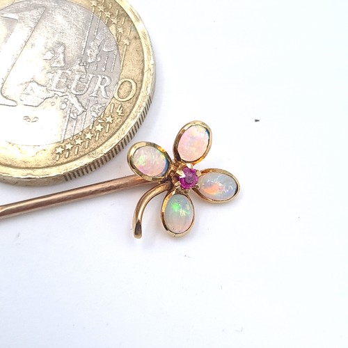 49 - A beautiful opal and ruby gemstone four leaf clover stick pin in presentation box.