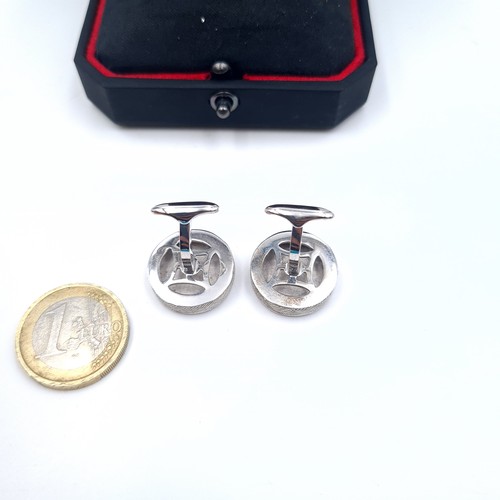 597 - A pair of Egyptian hieroglyphic silver cuff links, boxed.