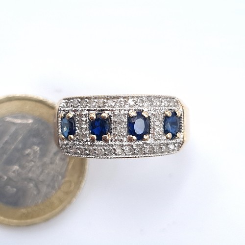 615 - Star Lot : A very good quality hallmarked 9K gold sapphire ring with diamond cluster, ring size P, w... 