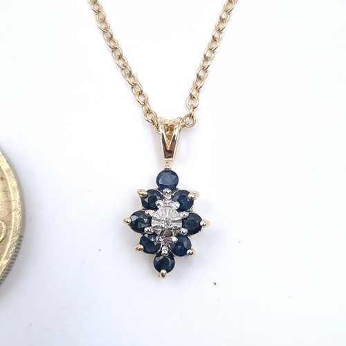 625 - Star Lot : A very pretty diamond and sapphire pendant necklace set in 9K gold, length of chain 44cm,... 