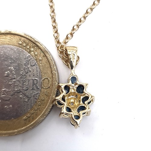 625 - Star Lot : A very pretty diamond and sapphire pendant necklace set in 9K gold, length of chain 44cm,... 