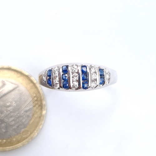 632 - Star Lot : A super pretty 18K diamond and sapphire ring, size Q, weight 2.78 grams, ring comes with ... 