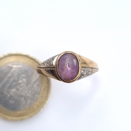 635 - Star Lot : A 9k gold pink ruby stone ring with diamond shoulders, ring size O, weight 2.45 grams, bo... 