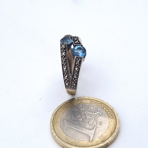 662 - An antique sterling silver two stone aquamarine ring set in marcasite, size M, weight 3.2 grams, box... 