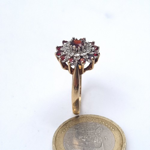 668 - A vintage 9K gold garnet and gemstone cluster ring hallmarked Birmingham, size R, weight 3.6 grams, ... 