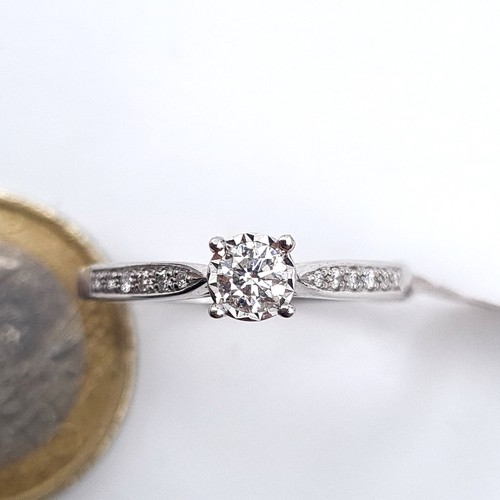 675 - Super Star Lot : A brand new super quality 9K white gold diamond ring set with central stone and dia... 