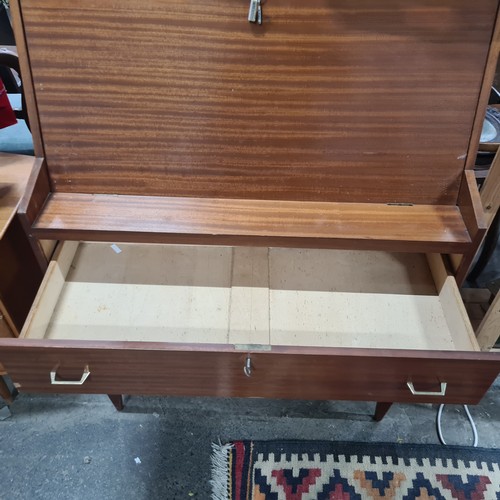 751 - Star Let : A super mid century writing bureau, with three drawers and fitted interior.  Info vendor ... 