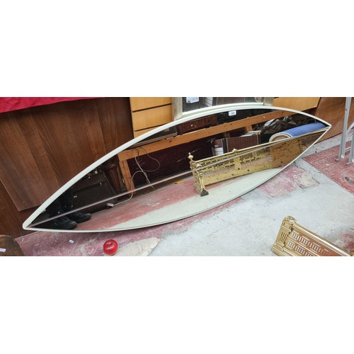 385 - A very stylish wall long wall mirror in form of a surfboard. Approx 1.5m long Vertical for a dressin... 