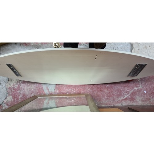 385 - A very stylish wall long wall mirror in form of a surfboard. Approx 1.5m long Vertical for a dressin... 