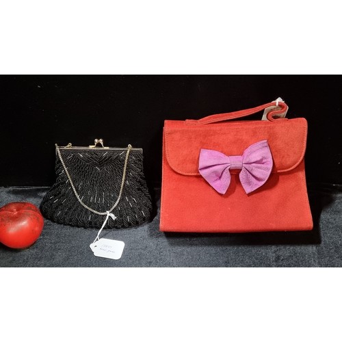 538 - Two elegant vintage ladies bag including a 1980's beaded purse and a 1977 suede Dollar Grand bag.