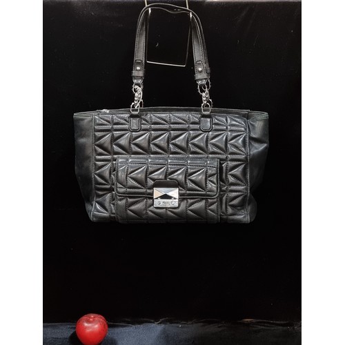 501 - A stunning and beautifully soft lambs leather Karl Lagerfeld designer handbag. Features stitched pad... 