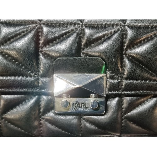 501 - A stunning and beautifully soft lambs leather Karl Lagerfeld designer handbag. Features stitched pad... 