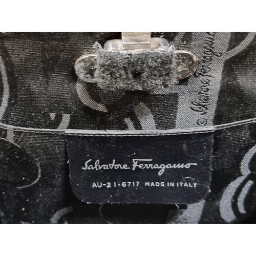 503 - Star Lot : A  rare Salvatore Ferragamo designer Gancini aluminum square box handbag. Features an unu... 