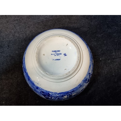 140 - Two items including an antique blue and white bowl along with a vintage paperweight.