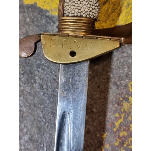 156 - Star Lot : An 1827 British naval officer sword made by Wilkinson of London. Named to the Britiania R... 