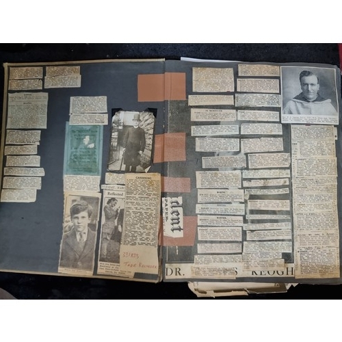 249 - Star Lot :An antique album Full of Irish newspaper cuttings and obituaries and prayer cards from the... 