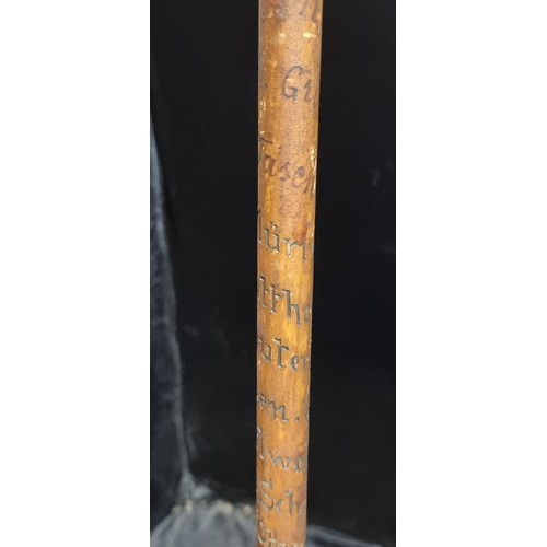 275 - A highly unusual vintage Swiss made gentleman's walking stick featuring an antler handle.