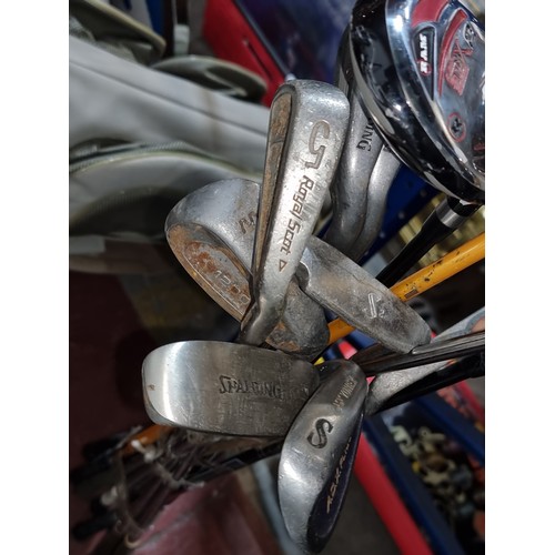 382 - twelve vintage golf clubs including irons, drivers, putters and more.