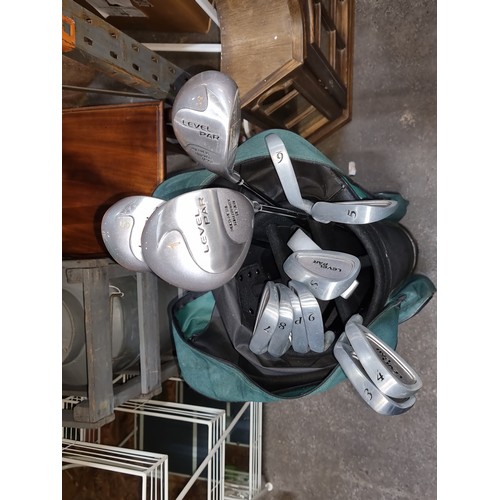 966 - 12 vintage golf clubs including irons, drivers, putters.