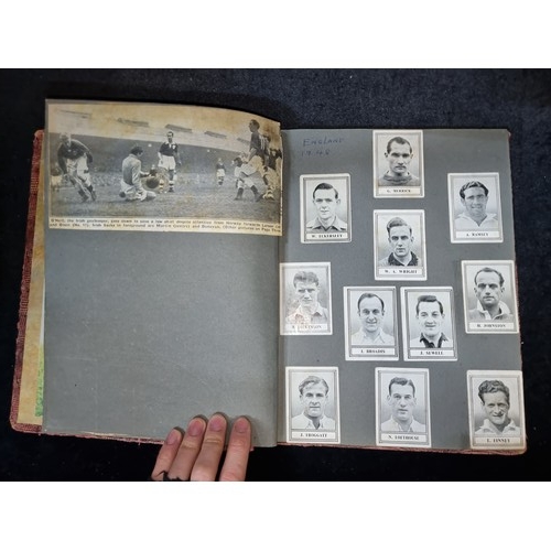 250 - A fabulous antique scrap book containing newspaper cuttings all on football including player profile... 