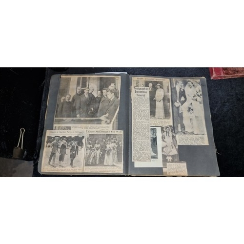 249 - Star Lot :An antique album Full of Irish newspaper cuttings and obituaries and prayer cards from the... 