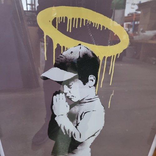 340 - A high quality print of a work originally by the street artist Banksy, titled 